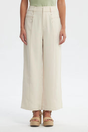 Pantalón recto beige claro para mujer con cintura elástica y detalles de botones en el frente diseño liso elegante