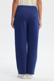 Pantalón buzo azul oscuro mujer calce recto con cordones ajustables y bolsillos laterales prenda lisa sin estampas