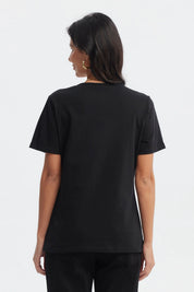 Polera negra mujer con estampado metálico de cebra y leopardo en el pecho texto Passion estilo moderno