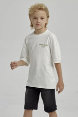 Polera Niño Print Posicional Crudo