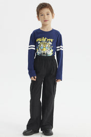 Pantalón niño negro calce recto con bolsillos laterales amplios ideal para estilo casual sin estampa lisa