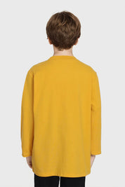 Polera Niño Print Relieve Mostaza