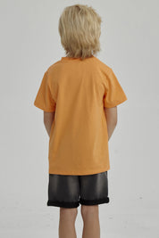 Polera Niño Básica Estampada Naranjo