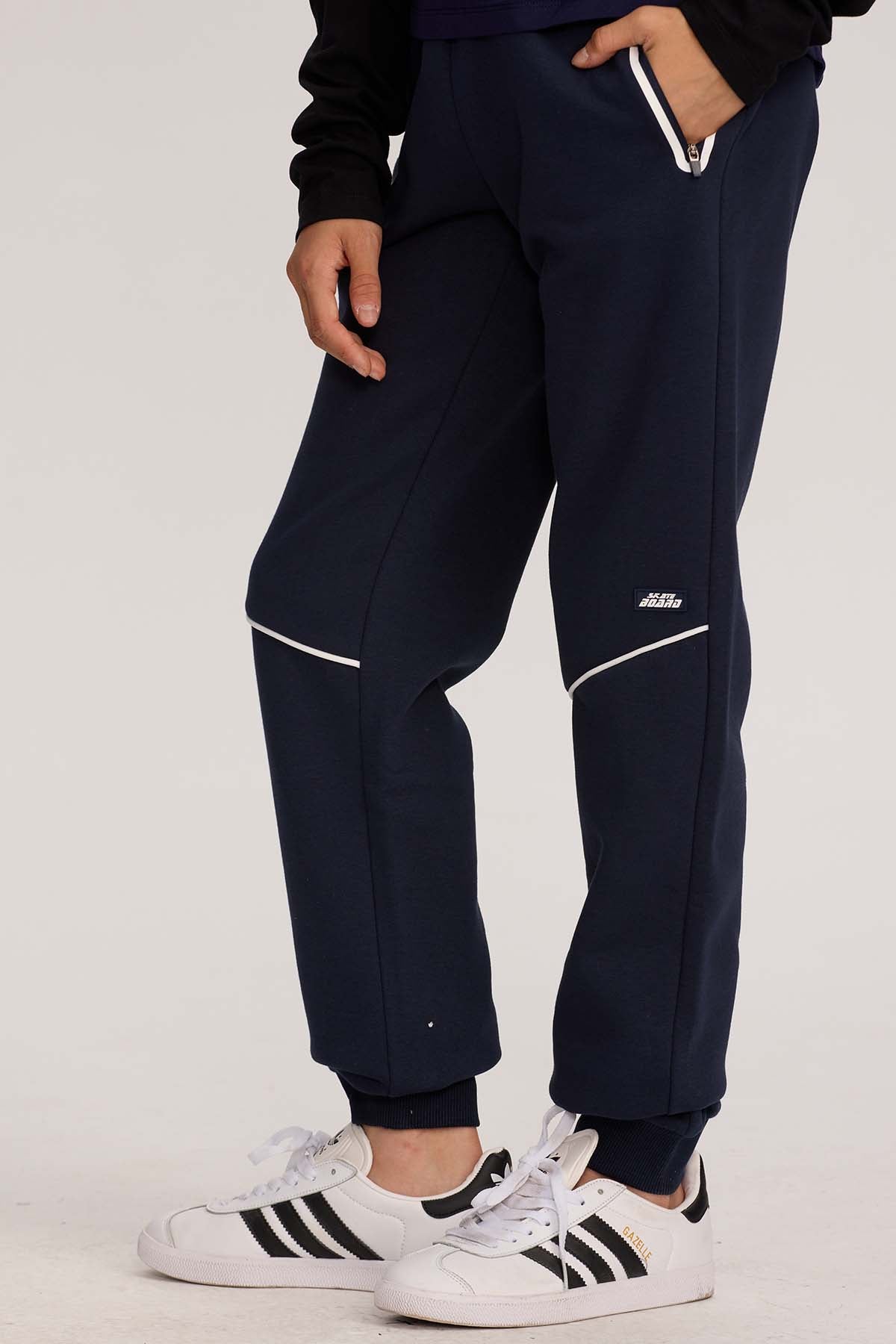 Pantalón Buzo Niño Con Cordón Y Bolsillo Azul