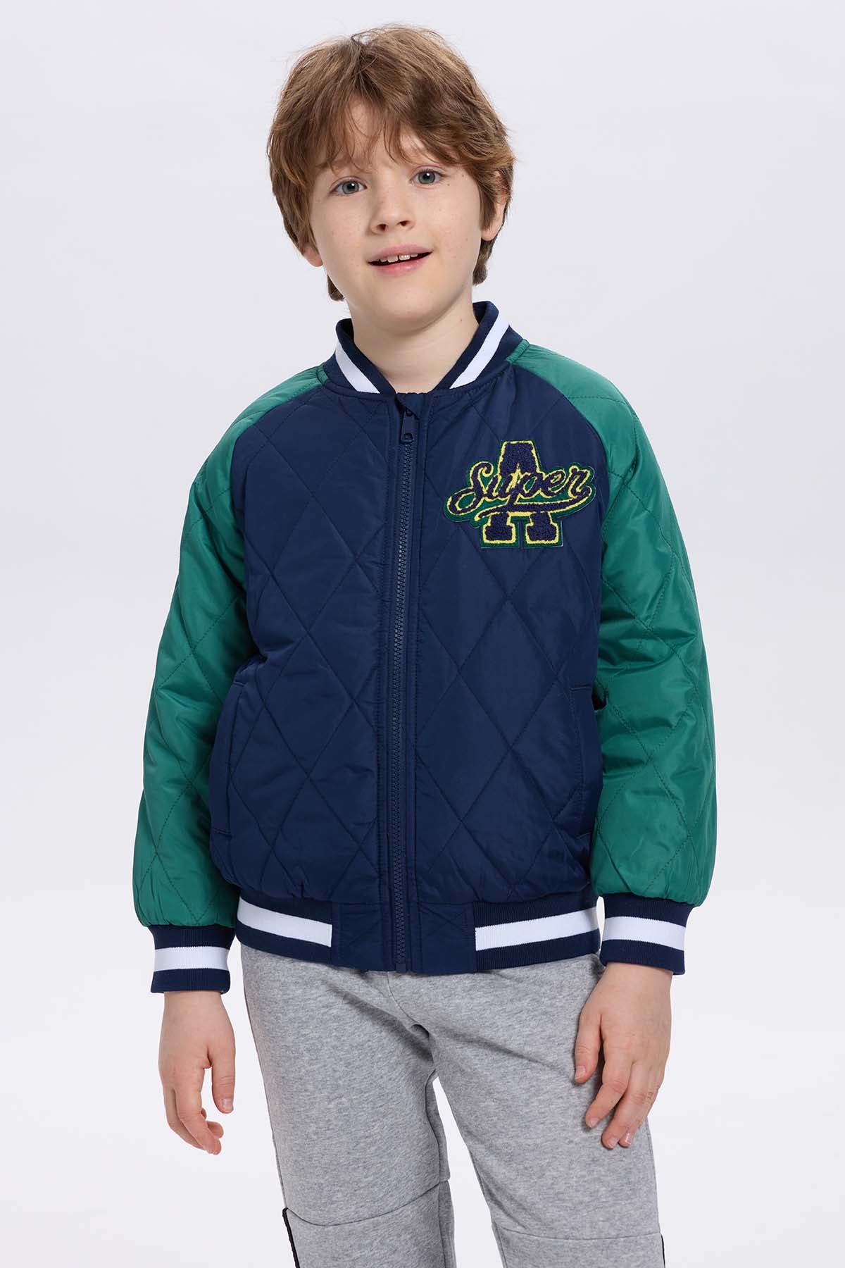 Chaqueta niño bomber azul oscuro con bordado