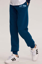 Pantalón Buzo niño Jogger Azul Petróleo