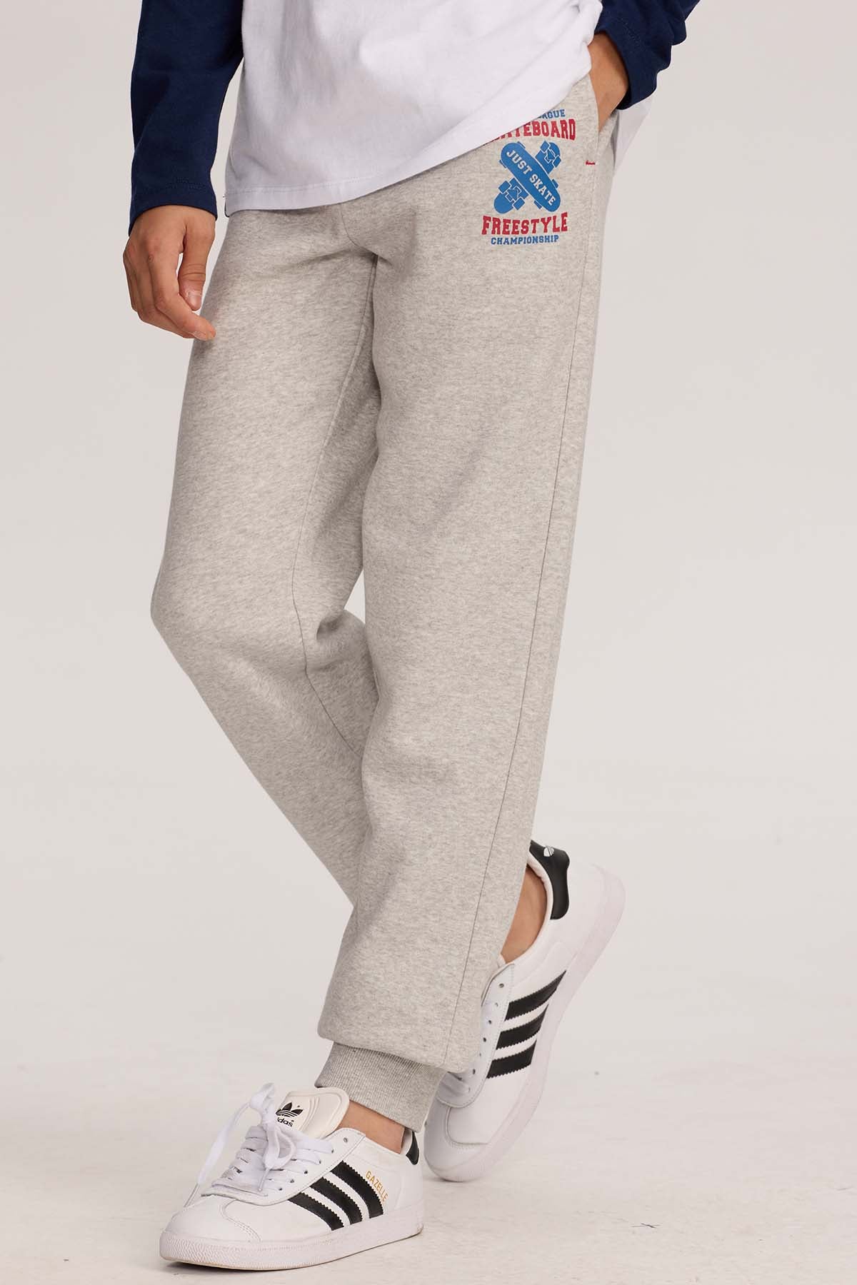 Pantalón buzo niño jogger gris melange