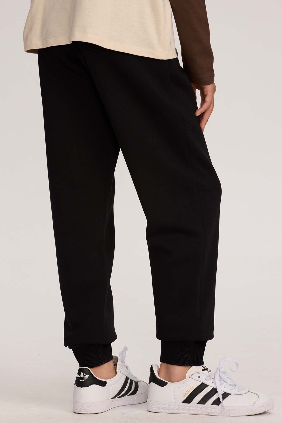 Pantalón buzo niño jogger negro