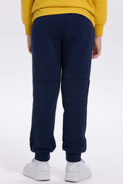 Pantalón buzo niño azul oscuro con rayas lateral