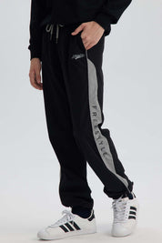 Pantalón Niño Jogger Con Cortes Negro