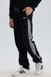 Pantalón Niño Jogger Con Cortes Negro