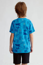 Polera niño azul claro con estampado de tigres y palmeras estilo Jungle King