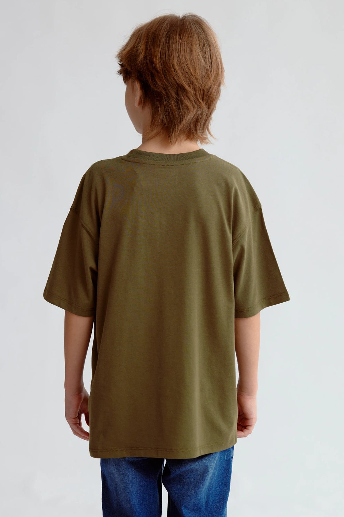 Polera niño verde militar con bordado NY y parche 1996 Adventure Camps