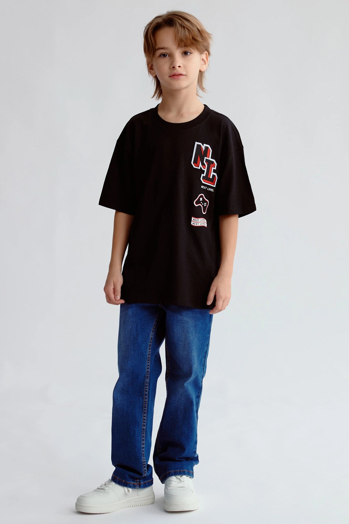 Polera Niño Bordado y Parche Naranjo