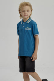 Polera Niño Piqué Con Parche Azul Petroleo