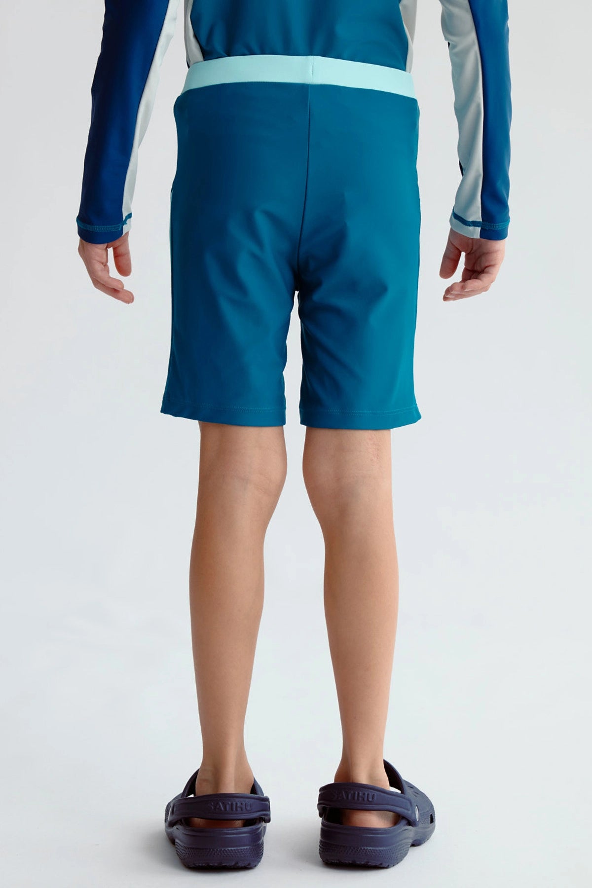 Short de baño verde para niño con diseño Palm Beach Gold Coast en la pierna izquierda