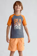 Traje de baño niño gris y naranja con estampado de Sea Sun Surfing