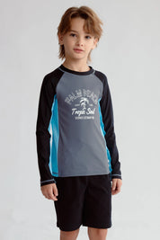 Traje de baño gris para niño con estampado de Palm Beach y detalles en azul y negro