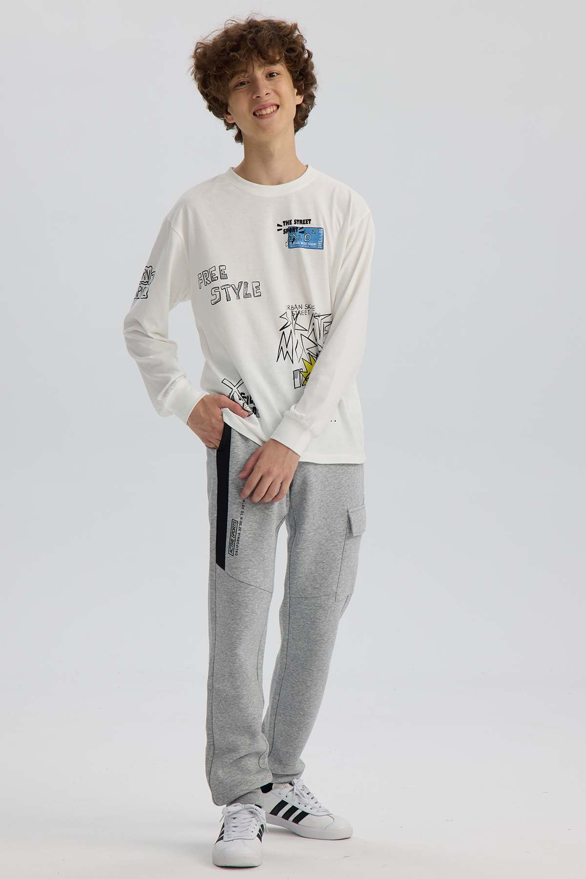 Pantalón Buzo Niño Cortes Bolsillo Gris Melange