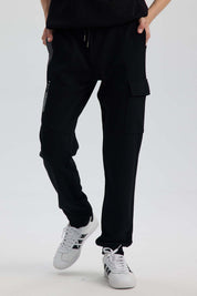 Pantalón Buzo Niño Cortes Bolsillo Negro