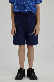 Bermuda Niño Bolsillo Parche Azul Oscuro