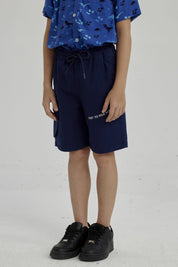 Bermuda Niño Bolsillo Parche Azul Oscuro