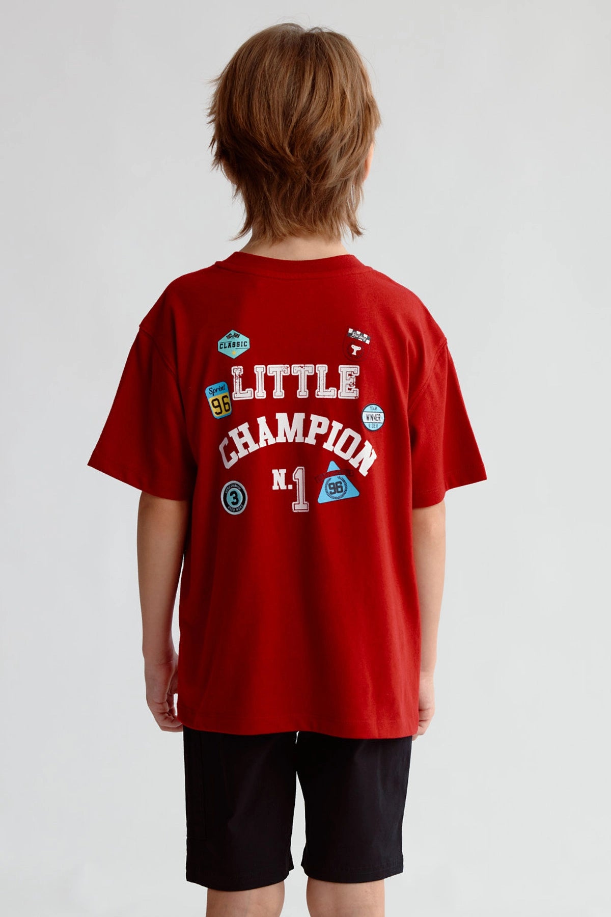 Polera Niño Print Posicional Burdeo