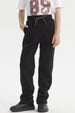 Pantalón buzo niño negro con calce recto y cordón en la cintura prenda lisa ideal para días de juego