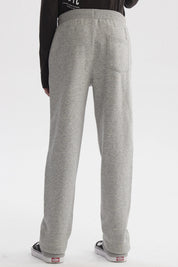 Pantalón buzo gris melange para niño con ajuste de cordón en la cintura y diseño liso ideal para actividades diarias