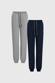 Pantalón buzo niño azul oscuro bipack con pretina ajustable y puños elásticos prenda lisa