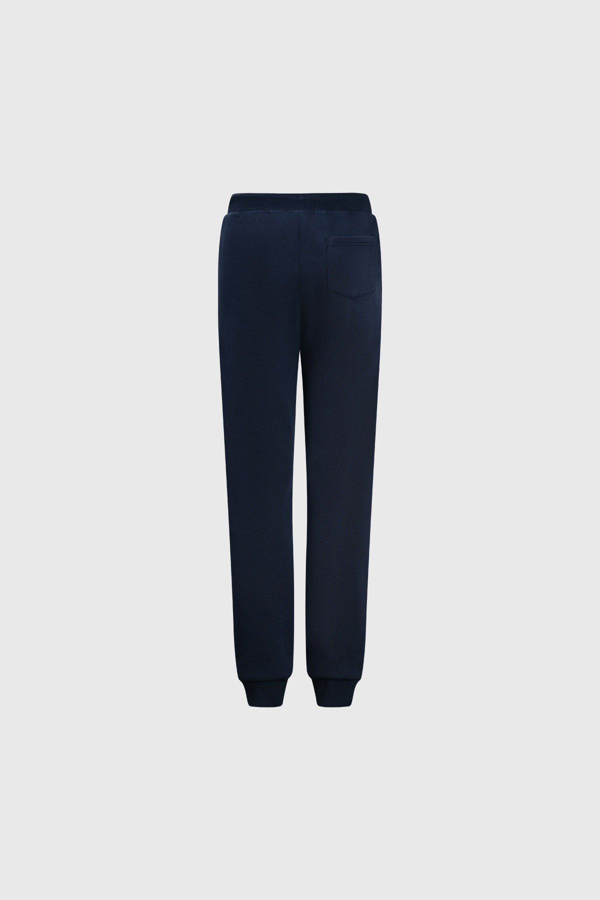 Pantalón buzo niño azul oscuro bipack con pretina ajustable y puños elásticos prenda lisa