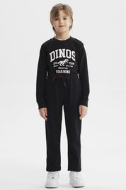 Pantalón buzo gris melange para niño con cintura ajustable y corte recto ideal para días de juego cómodo y sencillo