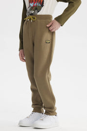 Pantalón buzo niño verde militar con ajuste de cordón en la cintura diseño liso cómodo para el día a día