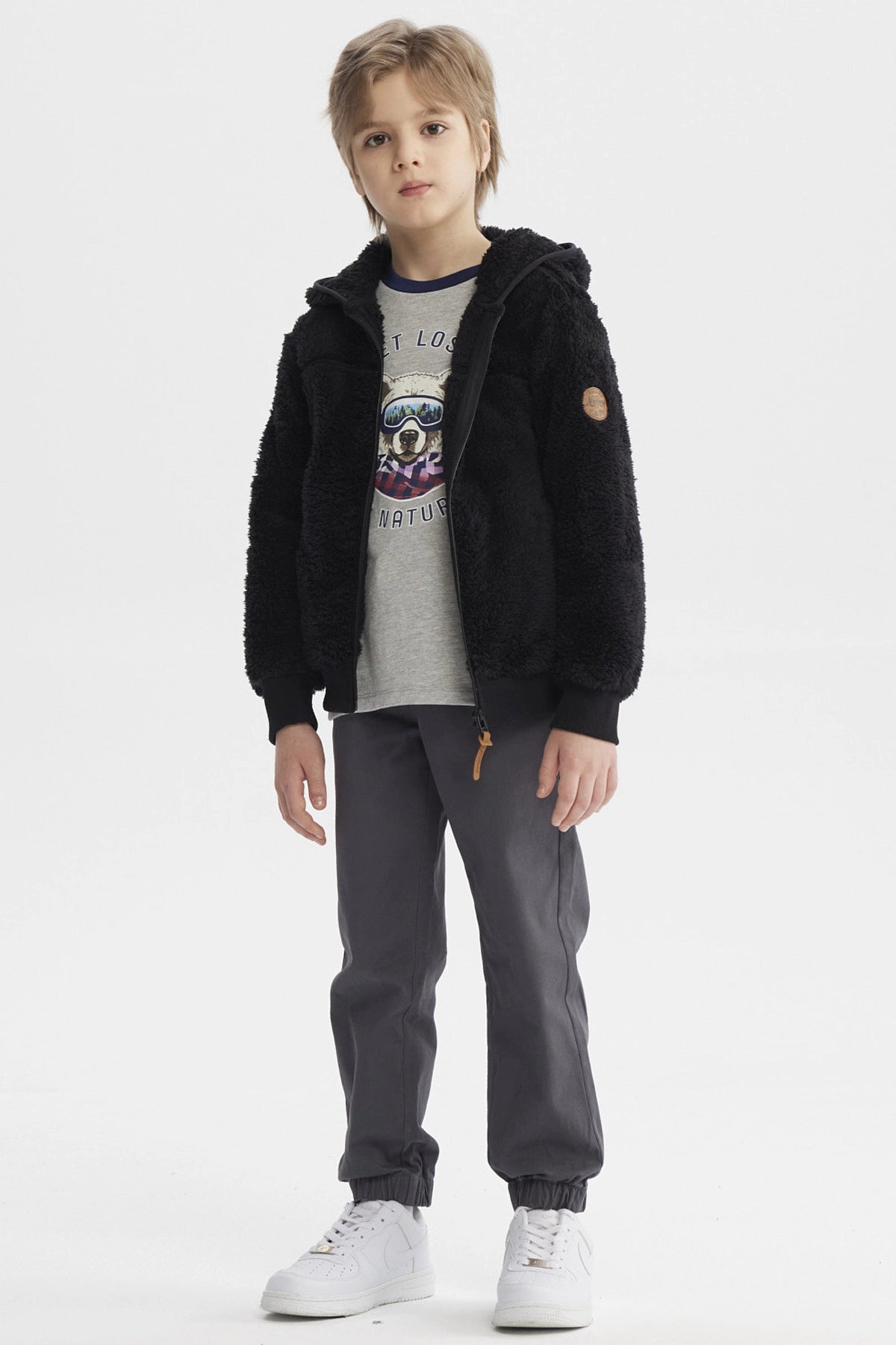 Polar negro para niño con capucha tejido peludo y cierre frontal diseño liso cómodo para el invierno