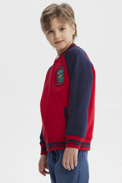 Chaqueta niño rojo con cuello V y mangas azul marino diseño dinosaurio en el pecho estilo casual divertida y cómoda
