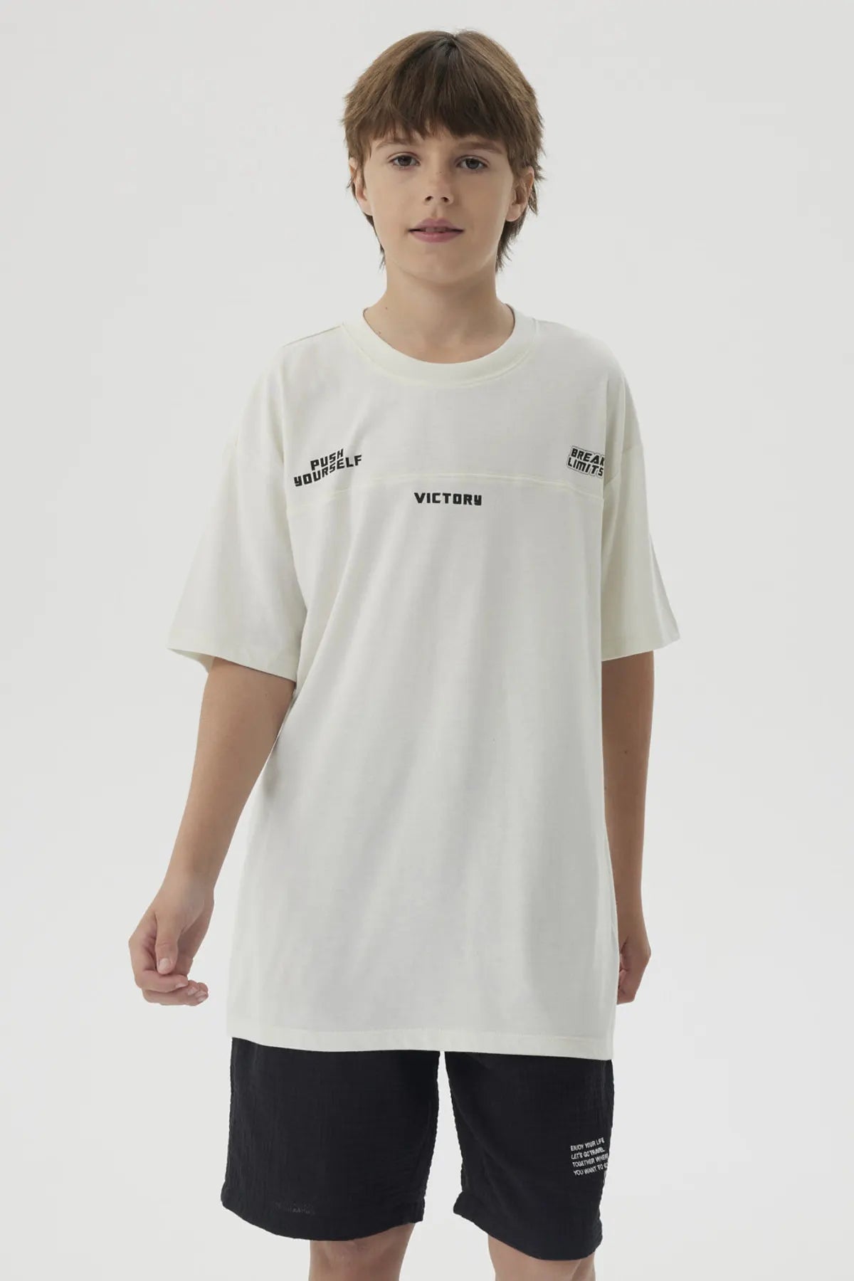 Polera Niño Costura Frontal Crudo