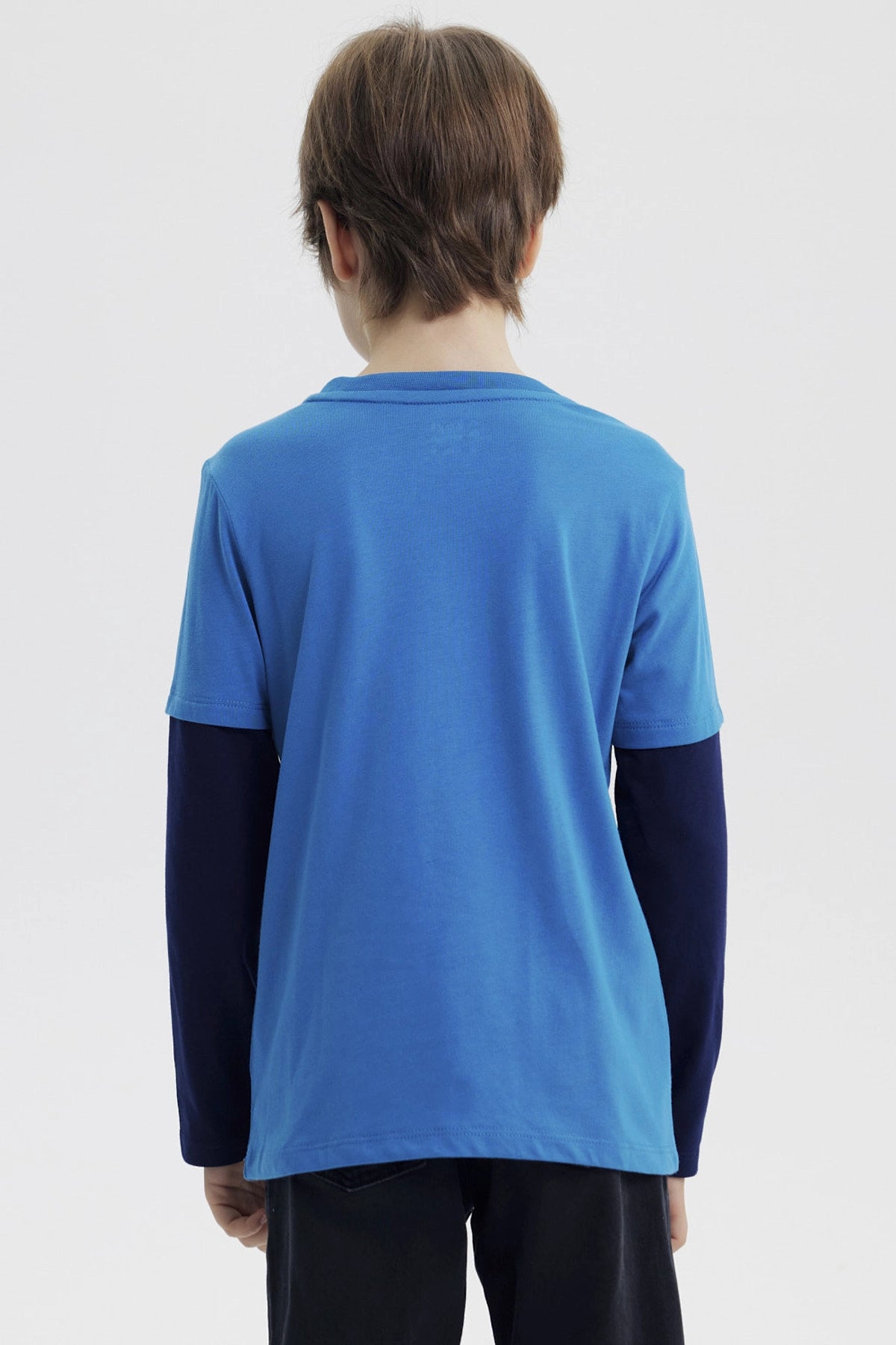 Polera azul petróleo para niño con diseño de tigre en el pecho estilo gráfico y texto Venice Beach