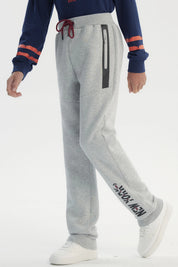 Pantalón Buzo Niño Pitillo Gris Melange