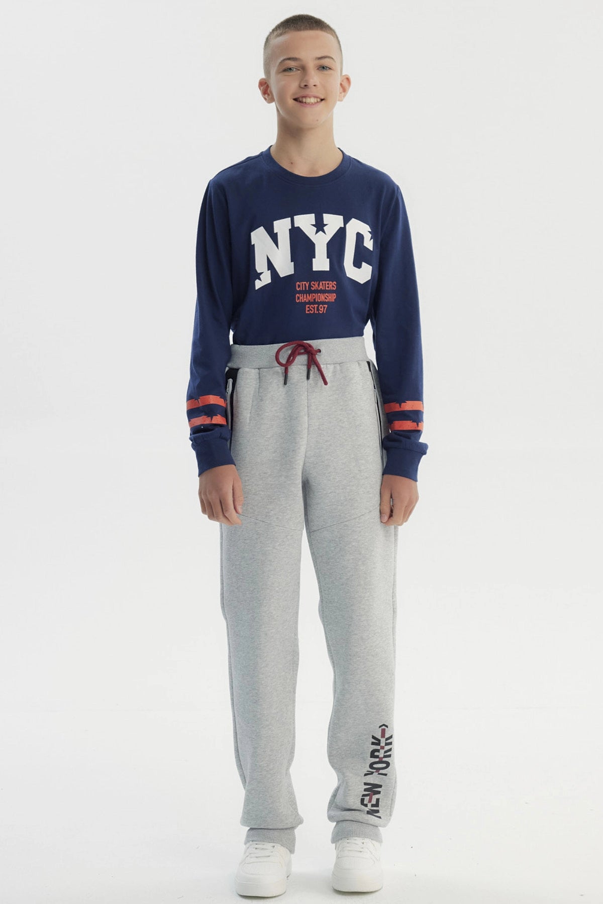 Pantalón Buzo Niño Pitillo Gris Melange