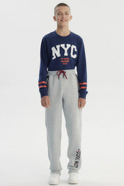 Pantalón Buzo Niño Pitillo Gris Melange