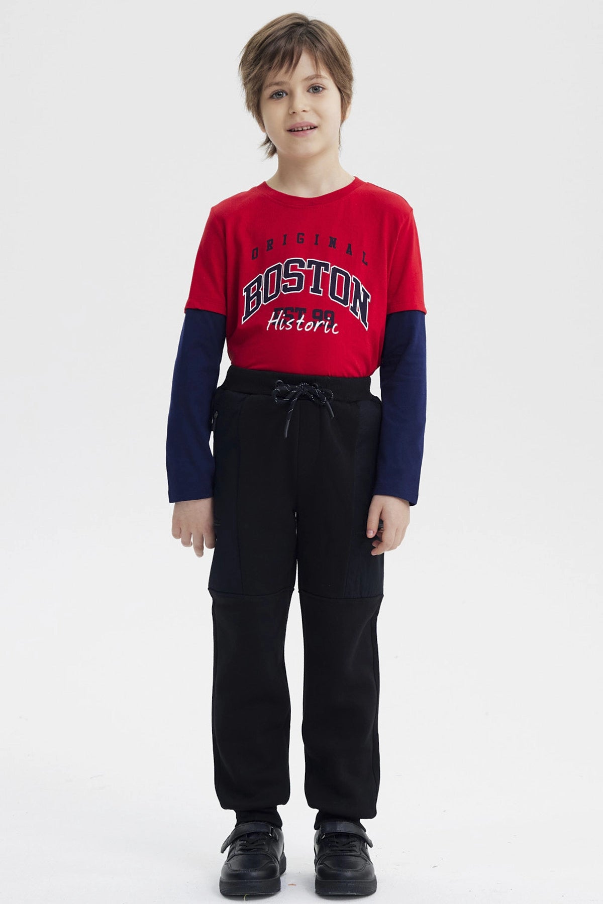 Pantalón Buzo Niño Pitillo Negro