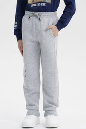 Pantalón Buzo Niño Pitillo Gris Melange