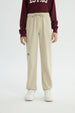 Pantalón Buzo Niño Pitillo Beige