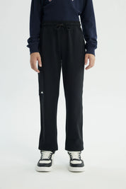Pantalón Buzo Niño Pitillo Negro