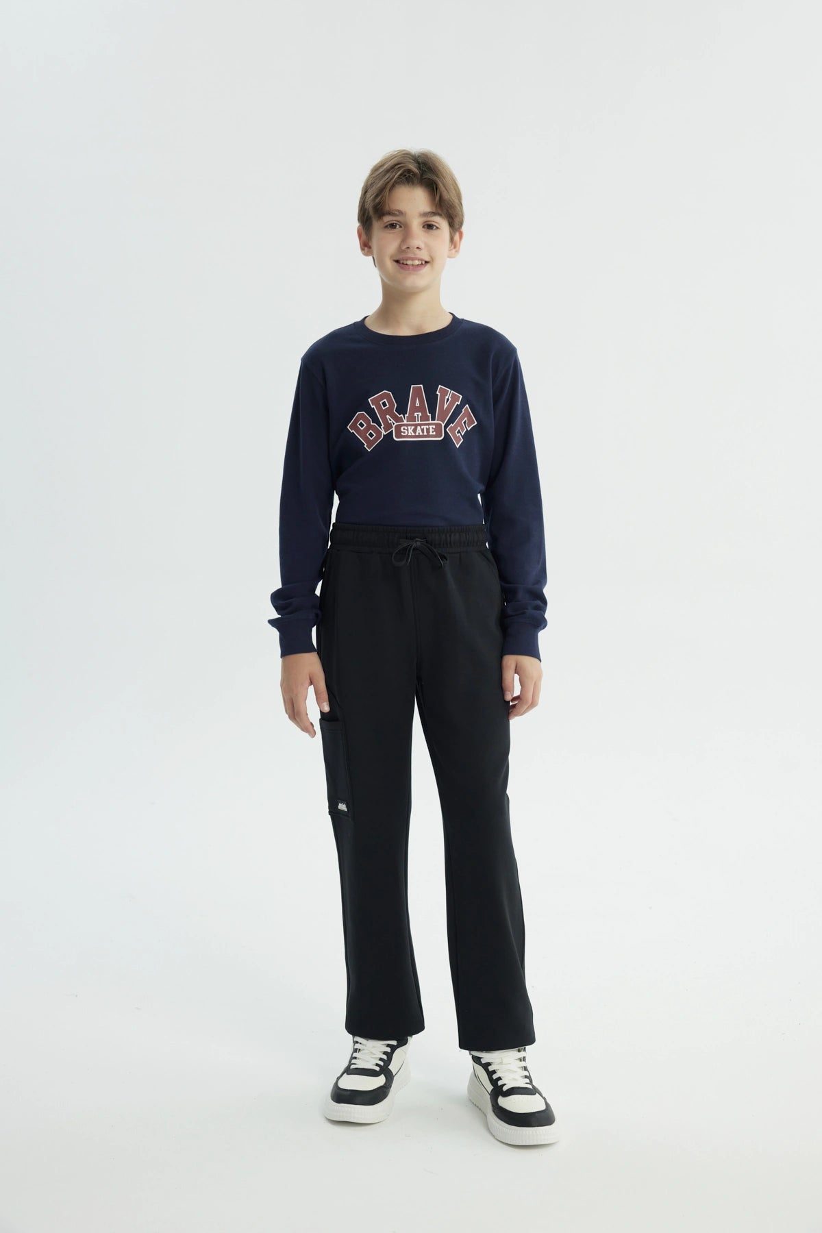 Pantalón Buzo Niño Pitillo Negro