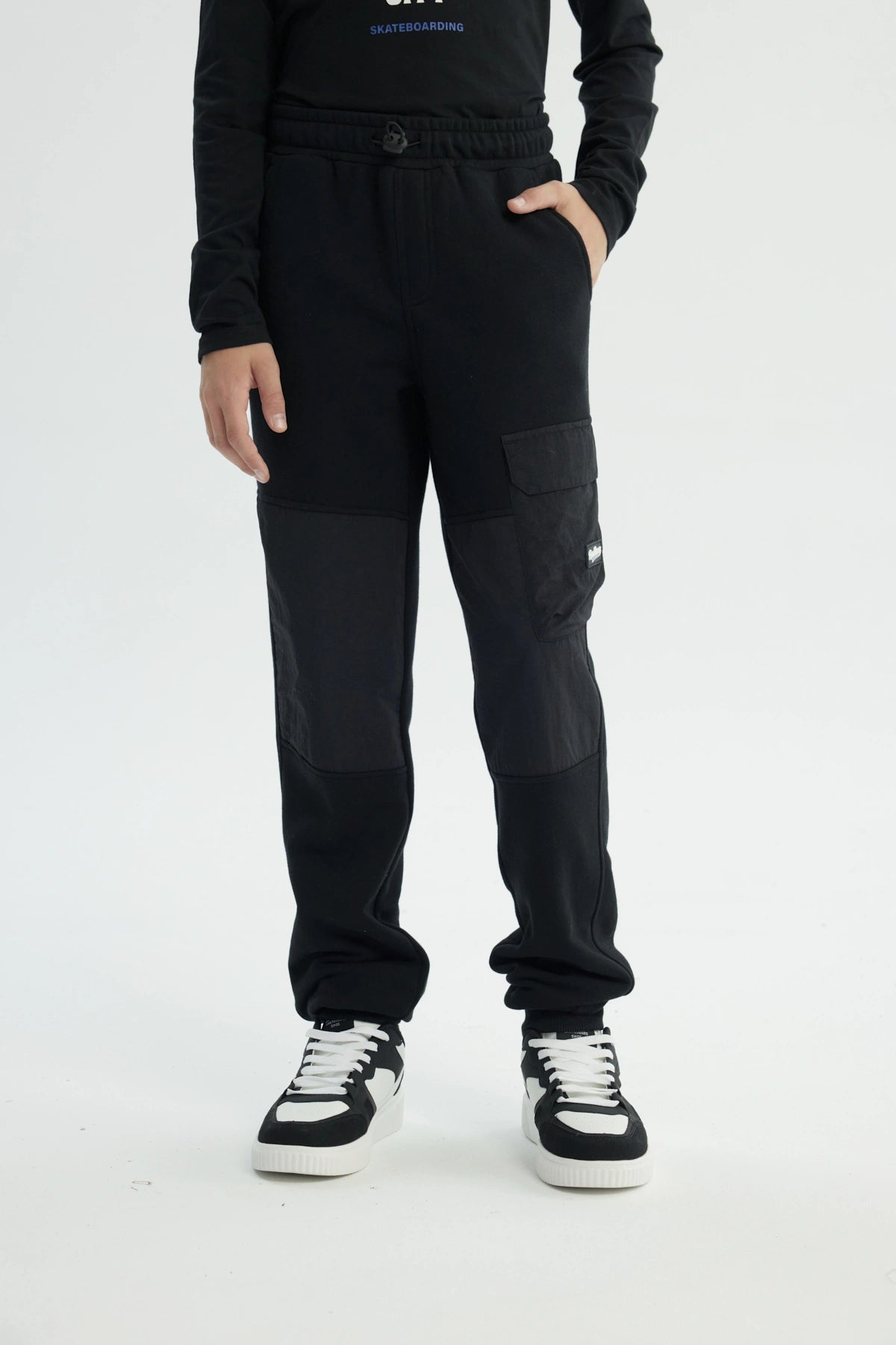 Pantalón Buzo Niño Pitillo Negro