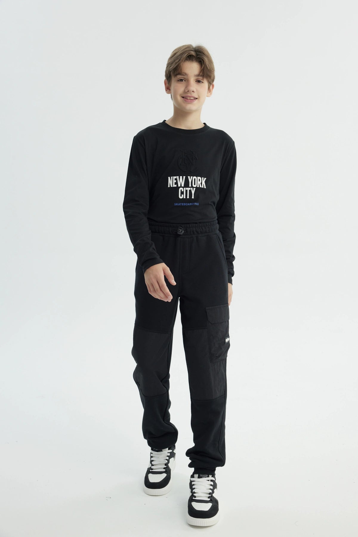 Pantalón Buzo Niño Pitillo Negro