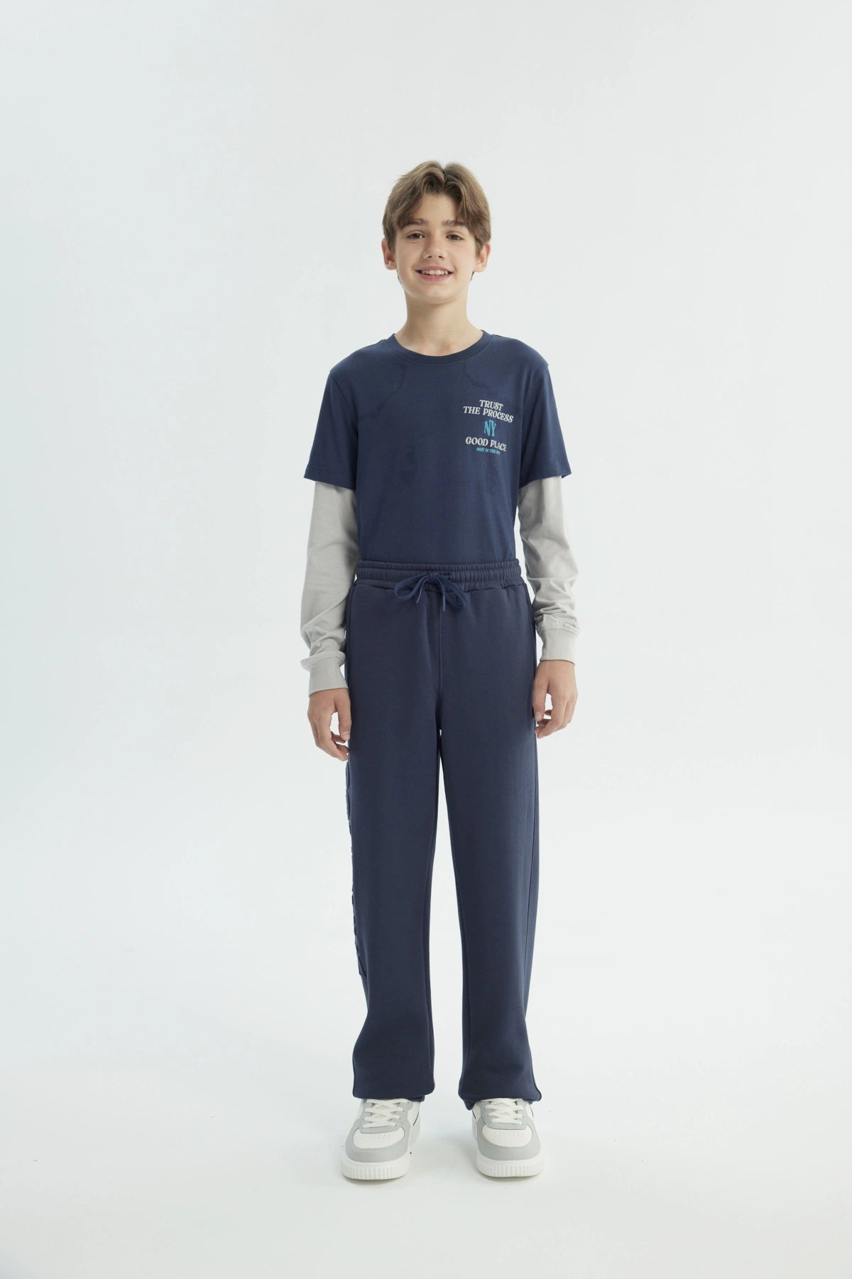 Pantalón Buzo Niño Pitillo Azul Oscuro