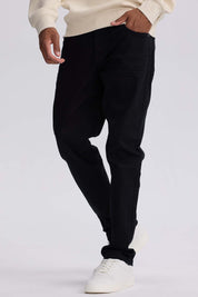 Jeans Hombre Slim Color Negro de denim elástico