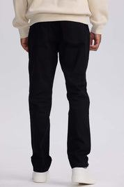 Jeans Hombre Slim Color Negro de denim elástico